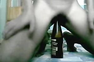 Exotic slut smashes her cookie with a bottle in livecam solo