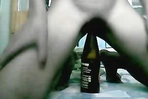 Exotic slut smashes her cookie with a bottle in livecam solo
