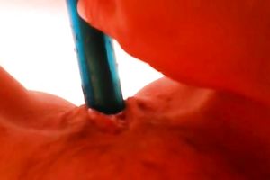 I love to stuff my bald slit with my miniature dildo