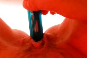 I love to stuff my bald slit with my miniature dildo