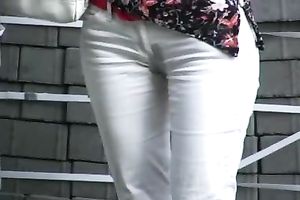 Tanya pees her panties and takes her soaked raiment off