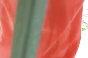 Redhead skank Sveta changes her moist clothing in the street