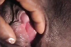 My bulky dark husband lets me play with her large clitoris