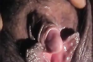 My bulky dark husband lets me play with her large clitoris