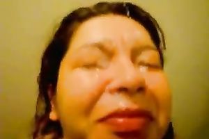 My perspired dark brown sweetheart receives a protein facial mask
