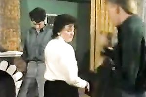Ugly looking wench pounds her hungry throat with 2 haired penises at the same time