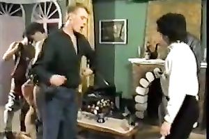 Ugly looking wench pounds her hungry throat with 2 haired penises at the same time