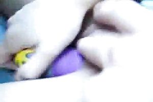 Shameless housewife drives the car during the time that petting her snatch with vibrator