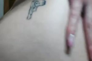 My tattooed girlfriend enjoys showing off her well-shaped butt