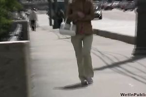 Redhead whore Tanya pees her panties outdoors in solo clip