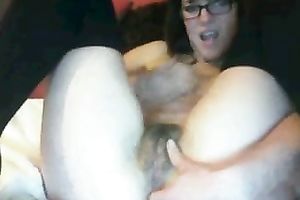 Mature woman in glasses finger copulates herself like avid