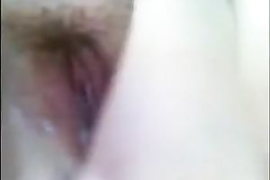 Hairy white cunt acquires sticky and creamy during masturbation