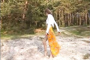 Skinny beauty with petite billibongs is going to swim in lake