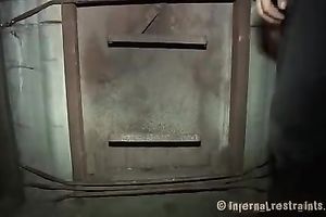 Busty blondie is bounded and suspended below the ceiling