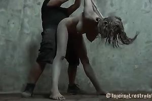 Busty blondie is bounded and suspended below the ceiling