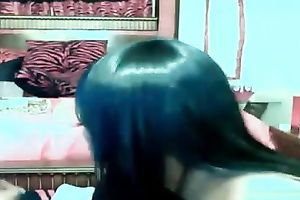 Ebony bitch with pierced navel bonks herself with her sex toy