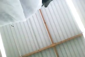 Mature woman caught on the movie scene in public upskirt