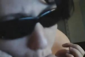 Super slutty nympho in sunglasses knows how to give a astounding irrumation