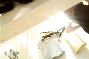 Spying on hot blond babe stripping in a changing room
