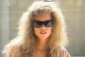 Curly haired seductress is jumping on her lover's prick like a cowgirl