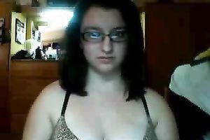 Busty geek shows of her hot and appetizing whoppers on camera
