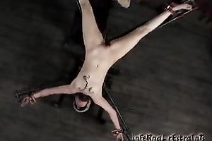 Dissolute blond sweetie with short hair is crucified previous to the punishment