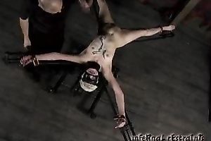 Dissolute blond sweetie with short hair is crucified previous to the punishment