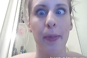 Blue eyed golden-haired shows off her slender body during the time that taking a shower
