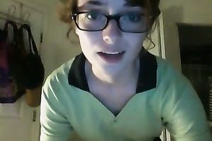 Nerdy redhead stumpet undresses on web camera like a diva