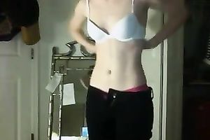 Nerdy redhead stumpet undresses on web camera like a diva