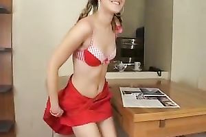 Pretty blond gal with pigtails disrobes and rubs her vagina