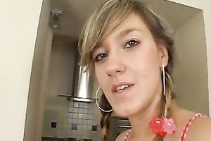 Pretty blond gal with pigtails disrobes and rubs her vagina