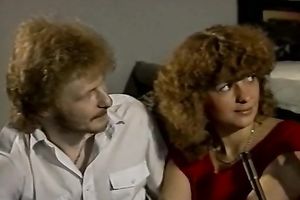 Sassy blonde floozy widens her legs for a guy with a fake penis