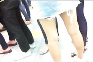 Following hawt Korean playgirl in hot short jeans petticoat