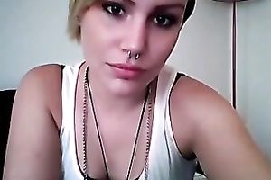 This punk wench knows how to smoker seductively on camera