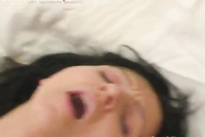 Dark-haired whore with merry pantoons copulates herself with her fake penis